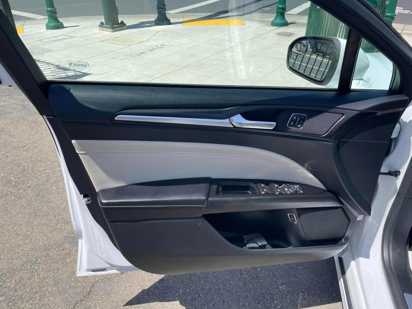 2018 WHITE /BLACK Ford Fusion Energi Titanium (3FA6P0SU6JR) with an 2.0L L4 DOHC 16V HYBRID engine, CVT transmission, located at 744 E Miner Ave, Stockton, CA, 95202, (209) 944-5770, 37.956863, -121.282082 - PLUS TAXES AND FEES - Photo#5